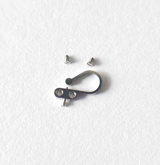 Omega regulator adjusting spring 563-1356 with screws caliber 563 564 565 macro detail