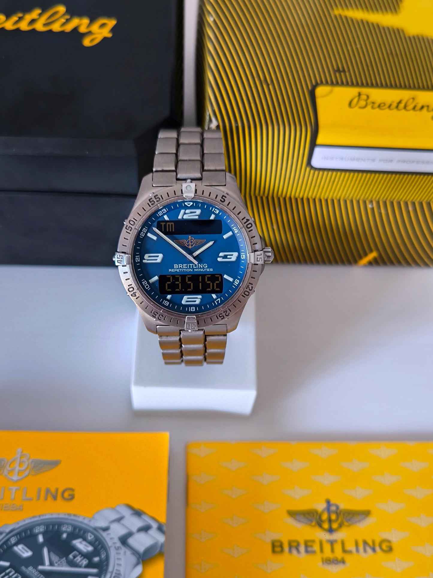 Breitling Aerospace analog digital dial close-up blue face