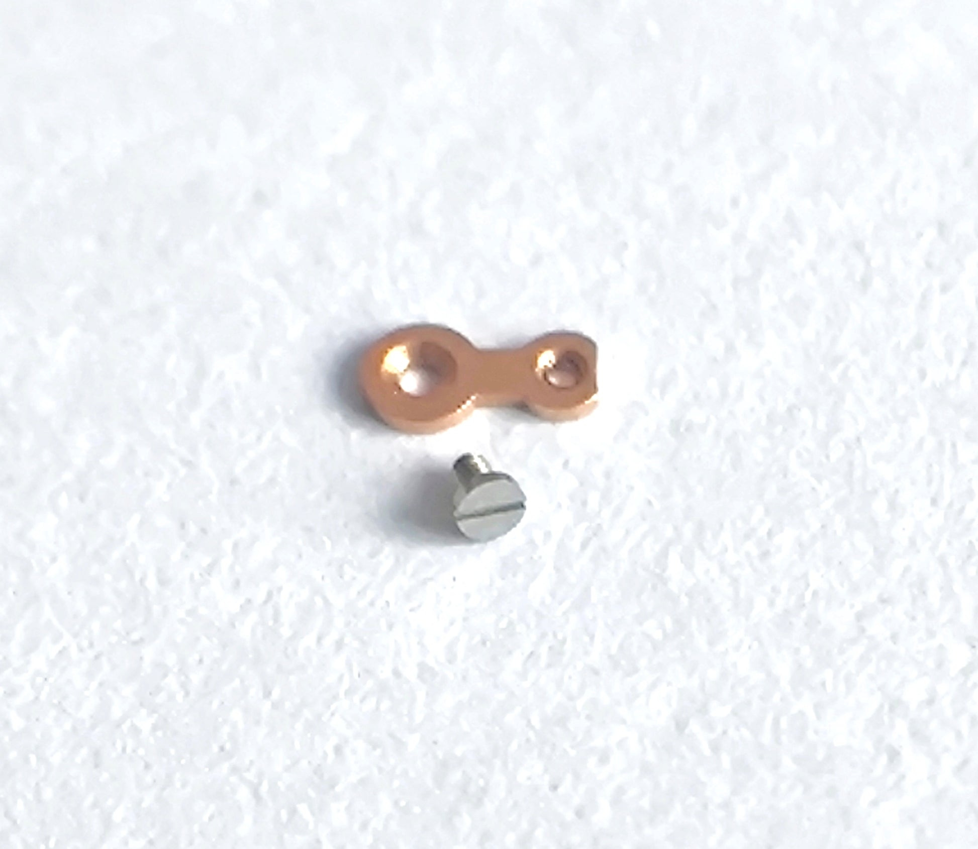 Omega caliber 550 bearing for ratchet wheel driving gear with screw detail