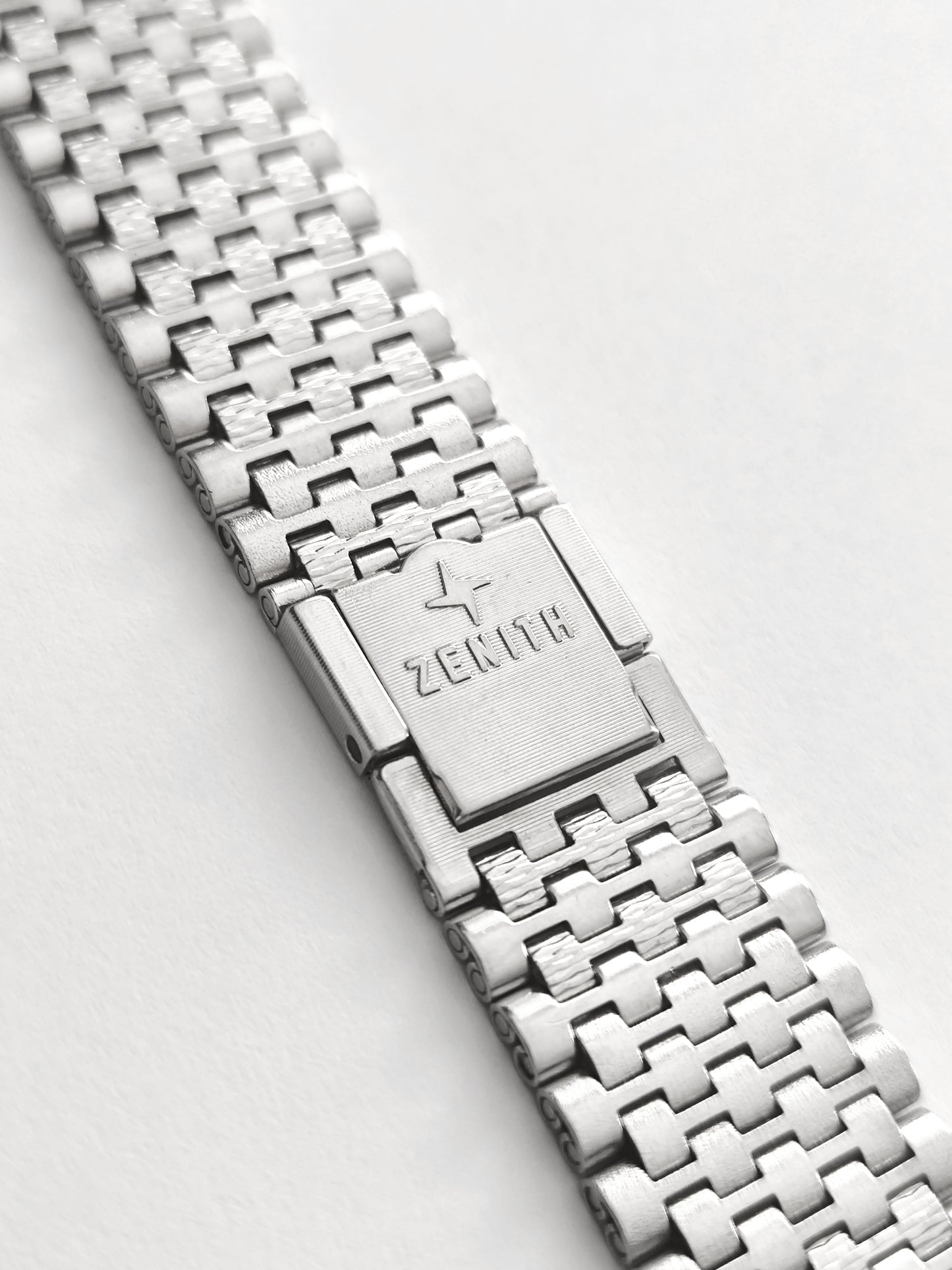 Zenith NSA stainless steel watch bracelet clasp signed Zenith close-up