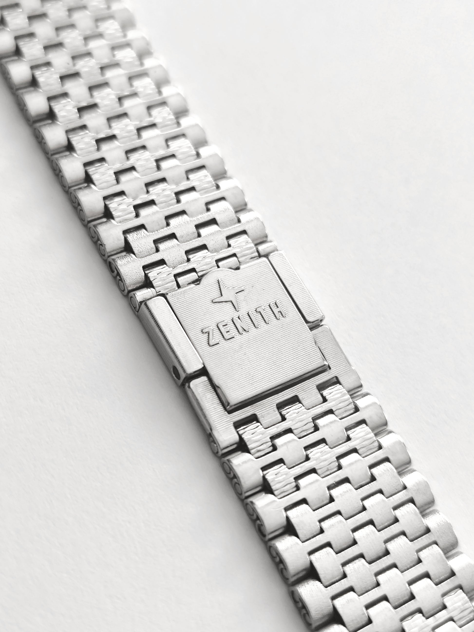 Zenith NSA stainless steel watch bracelet clasp signed Zenith close-up