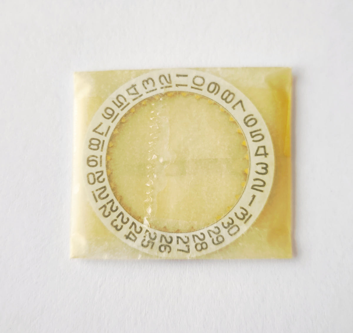 Omega 1040-1580 Date Indicator – NOS – Off-White / Ivory Color