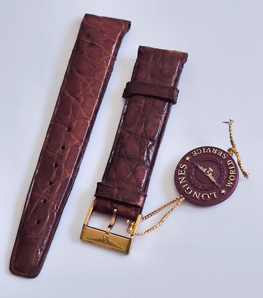 Vintage Longines 18mm leather watch strap and World Service tag